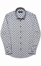 Load image into Gallery viewer, Floral patterned shirt on a white background