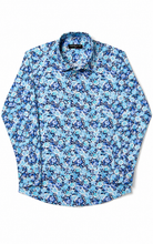 Load image into Gallery viewer, Blue floral patterned shirt on a white background